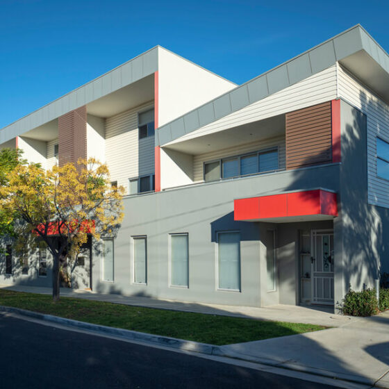 Multi-unit new build in Sunshine, Melbourne using a Mitten Vinyl Satin Grey Cambridge profile, commercially installed by Vinyl Cladding Professionals.