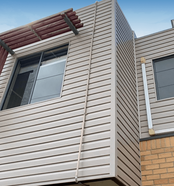 5 townhouse multi-build upper storey reclad in Duratuff Heather cladding profile, Doncaster East, Melbourne. Install by VCP.