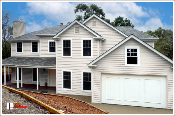 Modern 2 storey house clad with Cambridge Bone White | Vinyl Cladding Professionals